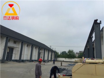 門式鋼結(jié)構(gòu)拱形屋頂設(shè)計與倉儲應(yīng)用